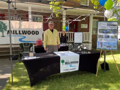 2026 Periodic Update information booth at Millwood Daze